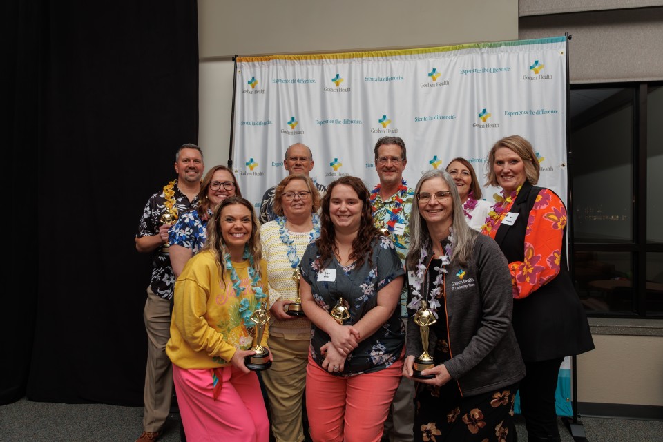 A group of Goshen Health Colleagues posing for an awards picture