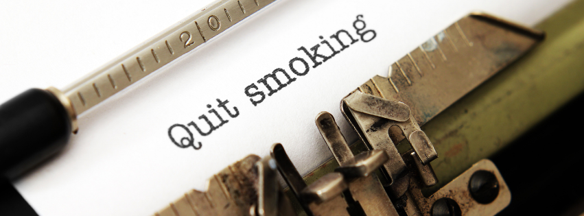 Paper in an old type-writer that says 'Quit smoking'