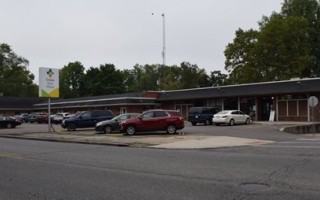 Goshen Home Medical building with cars in the front parking lot