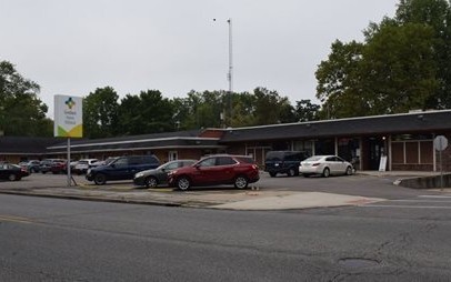 Goshen Home Medical building with cars in the front parking lot