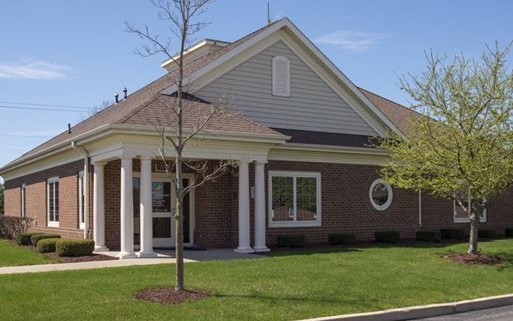 Goshen Sleep Disorders Center building with small trees and lawn in front