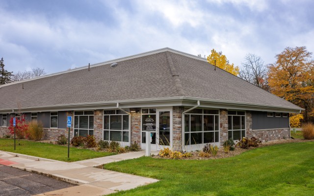 Goshen Physicians Family Medicine with OB Park building with sidewalk in front