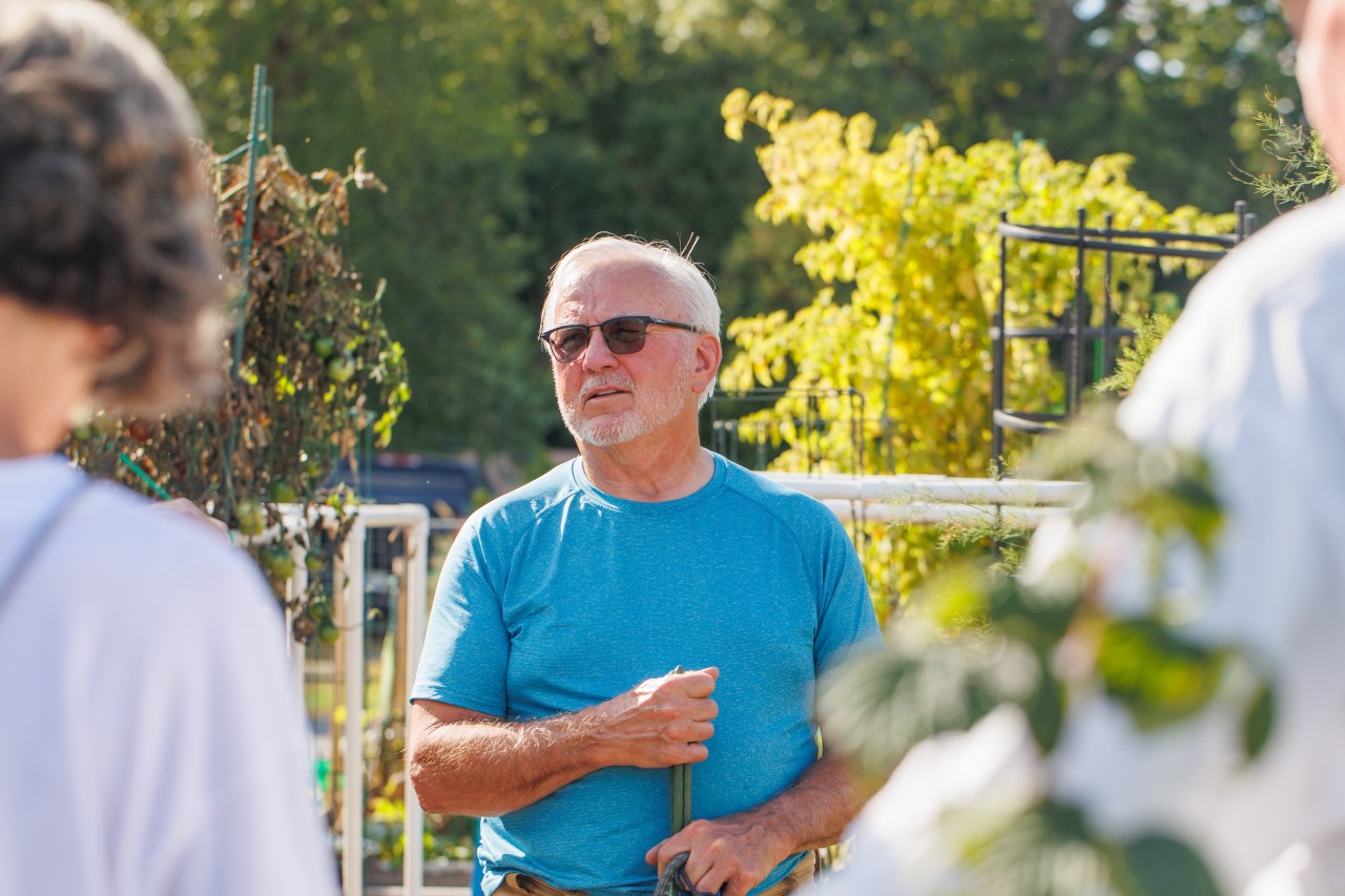 A man standing in a garden