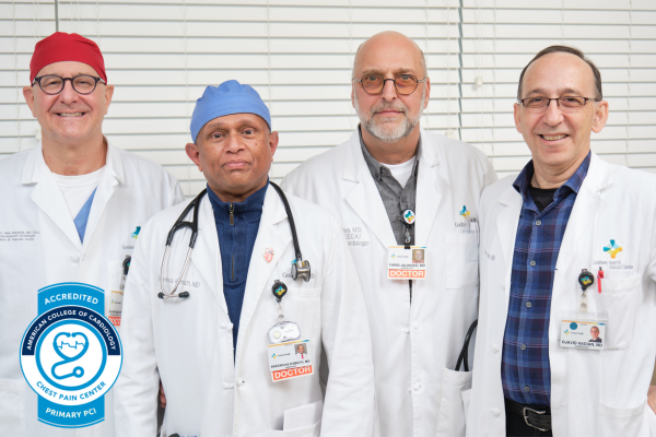 Four Heart and Vascular doctors standing next to each other