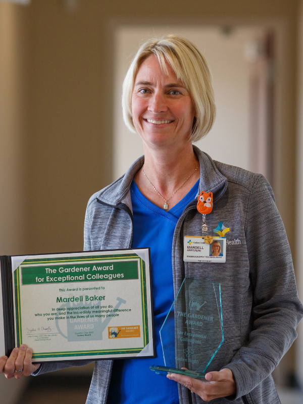 Woman holding awards