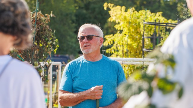 A man standing in a garden