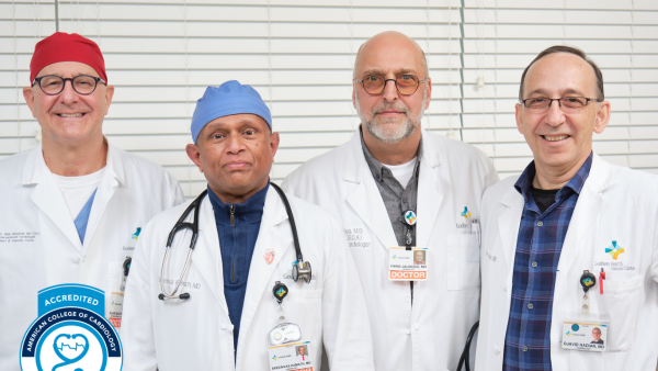 Four Heart and Vascular doctors standing next to each other