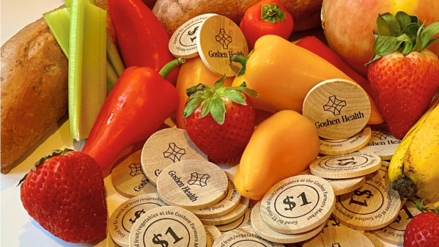 Fruits vegetables and wooden coins