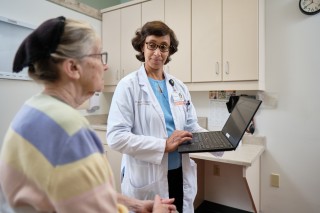 Doctor and patient in exam room