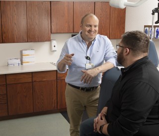 Doctor talking to patient