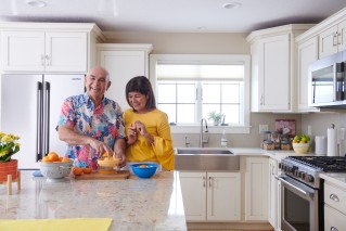 Couple preparing food in a kitchen