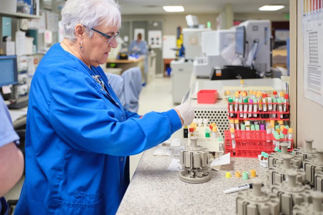 A technician working in the lab