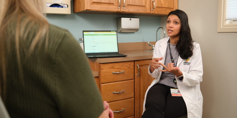 Doctor explaining something to a patient